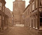Kerkstraat, linkse pand in 1940 afgebrand. Voor meer details klik hier.